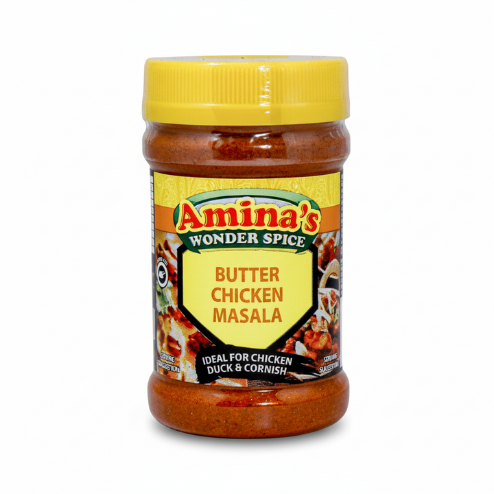 Jar of Amina's Wonder Spice Butter Chicken Masala on a green background