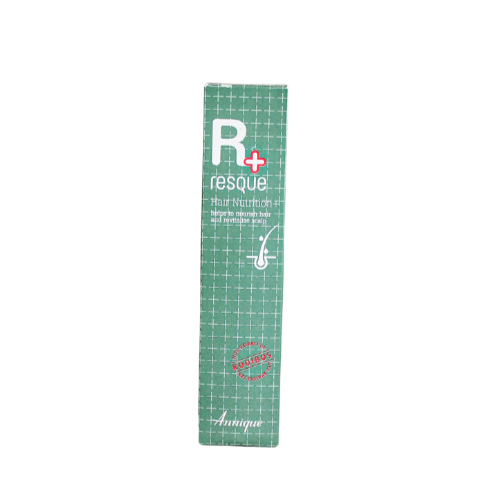 A bottle of Annique Resque Hair Nutrition, with a green and white label, designed for hair care.